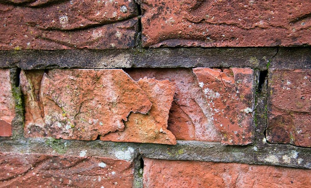 how to stop water coming through brick walls